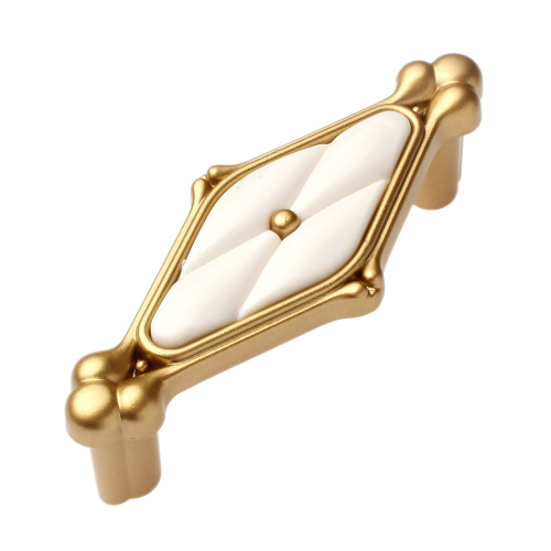 ручка кнопка astor 64мм. матовое золото с белой вставкой ромб купить в https://rmkmasterium.ru/